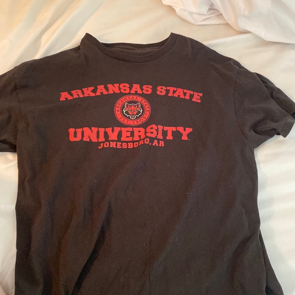 Arkansas State University t-shirt.